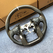 Load image into Gallery viewer, CZD For Toyota Tundra 2014/2015/2016/2017 carbon fiber steering wheel with perforated leather sides