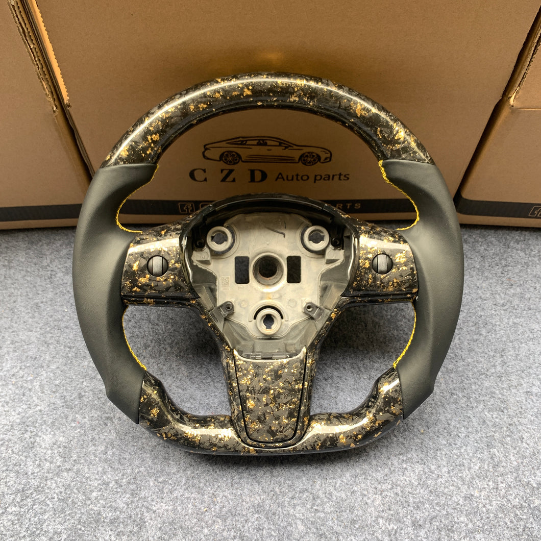 Tesla Model 3 2017/2018/2019/2020 carbon fiber steering wheel from CZD with forged CF with gold flakes