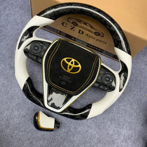 CZD Autoparts for Toyota 8th gen Camry se xse le xle 2018-2022 carbon fiber steering wheel gloss glod carbon fiber  toyota badge at airbag cover