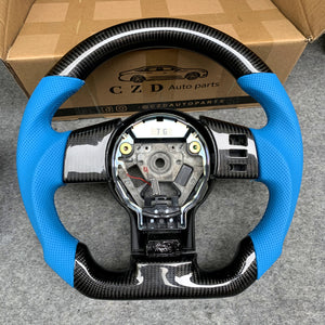 CZD Infiniti FX35 2003-2008 carbon fiber steering wheel with light blue perforated leather