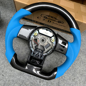 CZD Infiniti FX35 2003-2008 carbon fiber steering wheel with light blue perforated leather