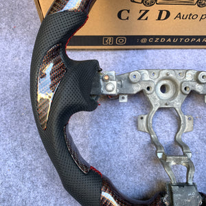 CZD Nissan Juke 2011-2017 golden wire carbon fiber steering wheel with logo