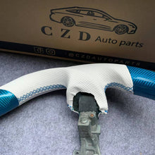 Load image into Gallery viewer, CZD Nissan Juke/Z34/370Z/Maxima carbon fiber steering wheel