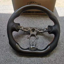 Load image into Gallery viewer, Juke carbon fiber steering wheels